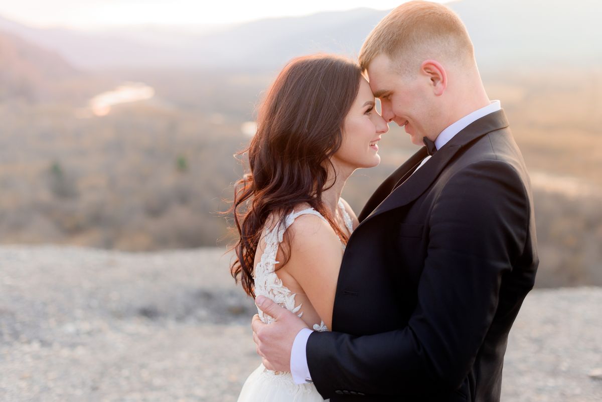 The Essential Wedding Facing Each Other