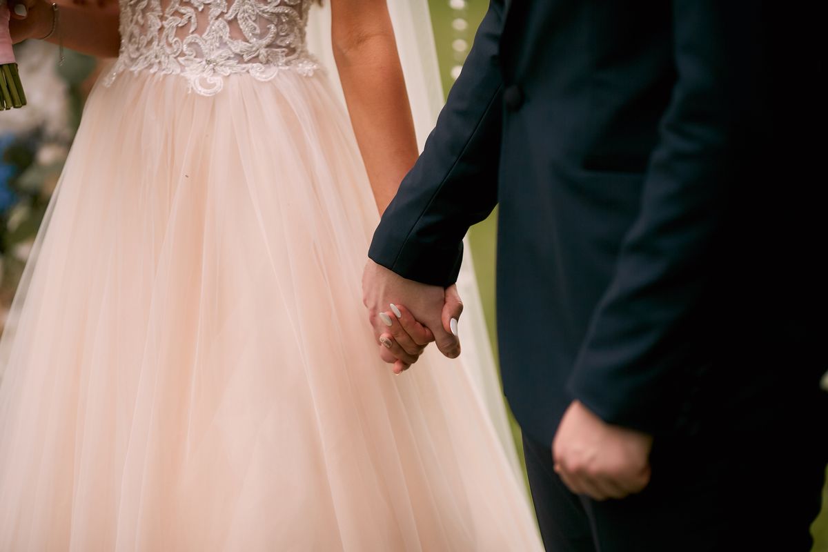 The Essential Wedding Holding Hands Side by Side 2