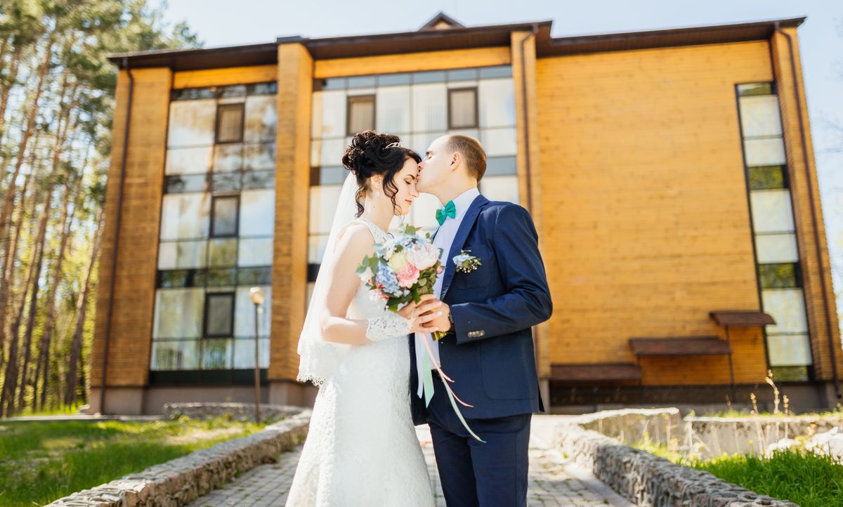 The Essential Wedding Poses Forehead Kiss